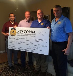 Western Region donates to Crossroads House-Batavia.